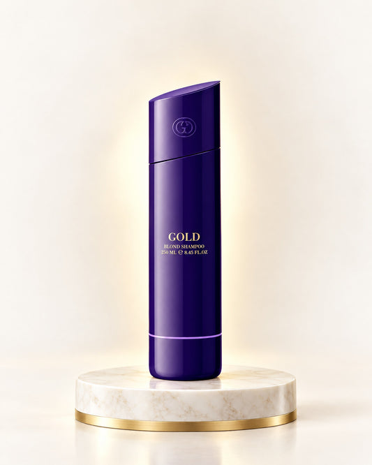 GOLD Haircare Blond Shampoo 250 ml auf weißem Marmorpodest mit Goldrand