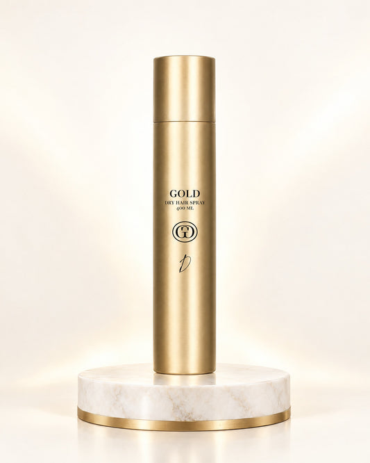 GOLD Dry Hairspray 400 ml in champagnergoldener Dose auf weißem Marmorpodest mit Goldrand