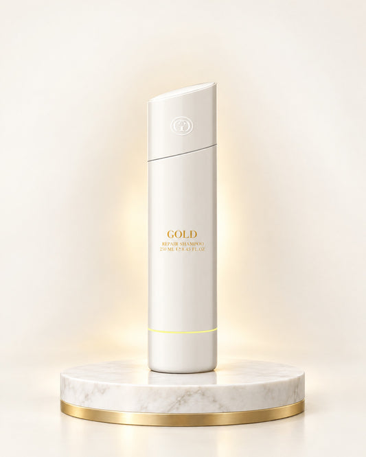 GOLD Haircare Repair Shampoo 250 ml auf weißem Marmorpodest mit Goldrand