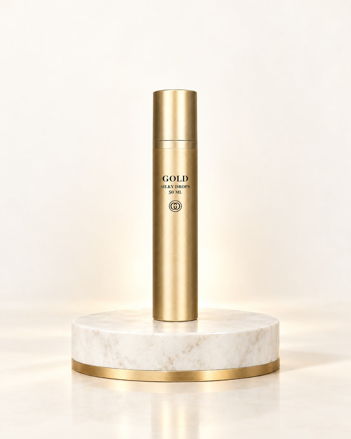 GOLD Haircare Silky Drops 50 ml in goldener Flasche auf weißem Marmorpodest mit Goldrand